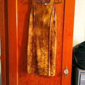 Dress mid length. Gold brown tone 100% rayon fully